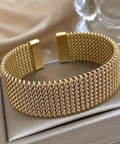 Trendy New Woven Stainless Steel Bracelet With A Golden Touch. Fashionable Accessory In Versatile Golden Tone.