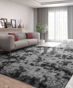 One Piece of an Extra-Large, Luxurious, Modern Area Rug Measuring 8X10 Feet, Suitable for The Living Room. It Features a Large Tie-Dyed, Fluffy Plush Shag Design, Is Anti-Slip, And Offers a Thick, Soft, Fuzzy Texture, Making It Perfect for Bedroom A