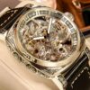 Men's Golden-Tone Automatic Mechanical Watch with Carved Hollow Skeleton Dial, Roman Numerals & World Time Function - Luxury Fashionable Round Watch for Casual & Formal Occasions, Formal Timepiece
